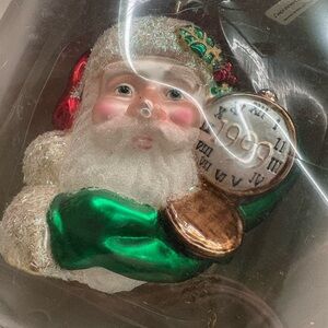 Festive Santa Ornament with Green and Gold Accents